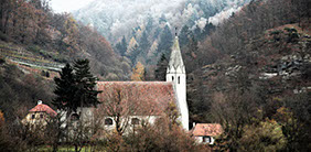 AMAwaterways river cruise showing cute medieval village church on Danube river cruise from Budapest to Nuremberg